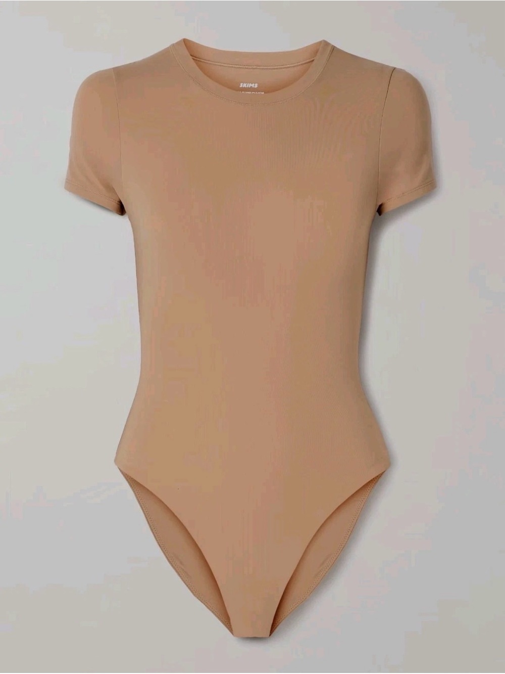 Skims Short Sleeve One-Piece Bodysuit in Nude